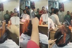 Un coiffeur coupe les cheveux de ses clients en les brûlant (Vidéo)