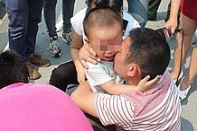 Chine: «Papa, reviens, ne saute pas!»