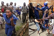 (Photos) Burundi: Une femme officier de police battue par des manifestants